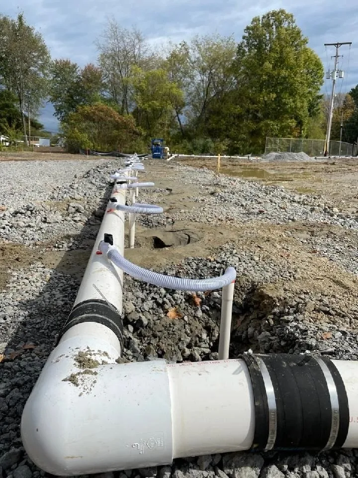A header pipe with the connections of a well-point dewatering line.